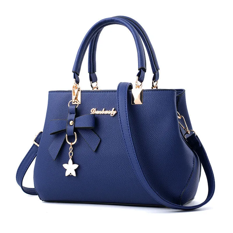 Michelle  Schultertasche mit Schleifenstern-Anhnger